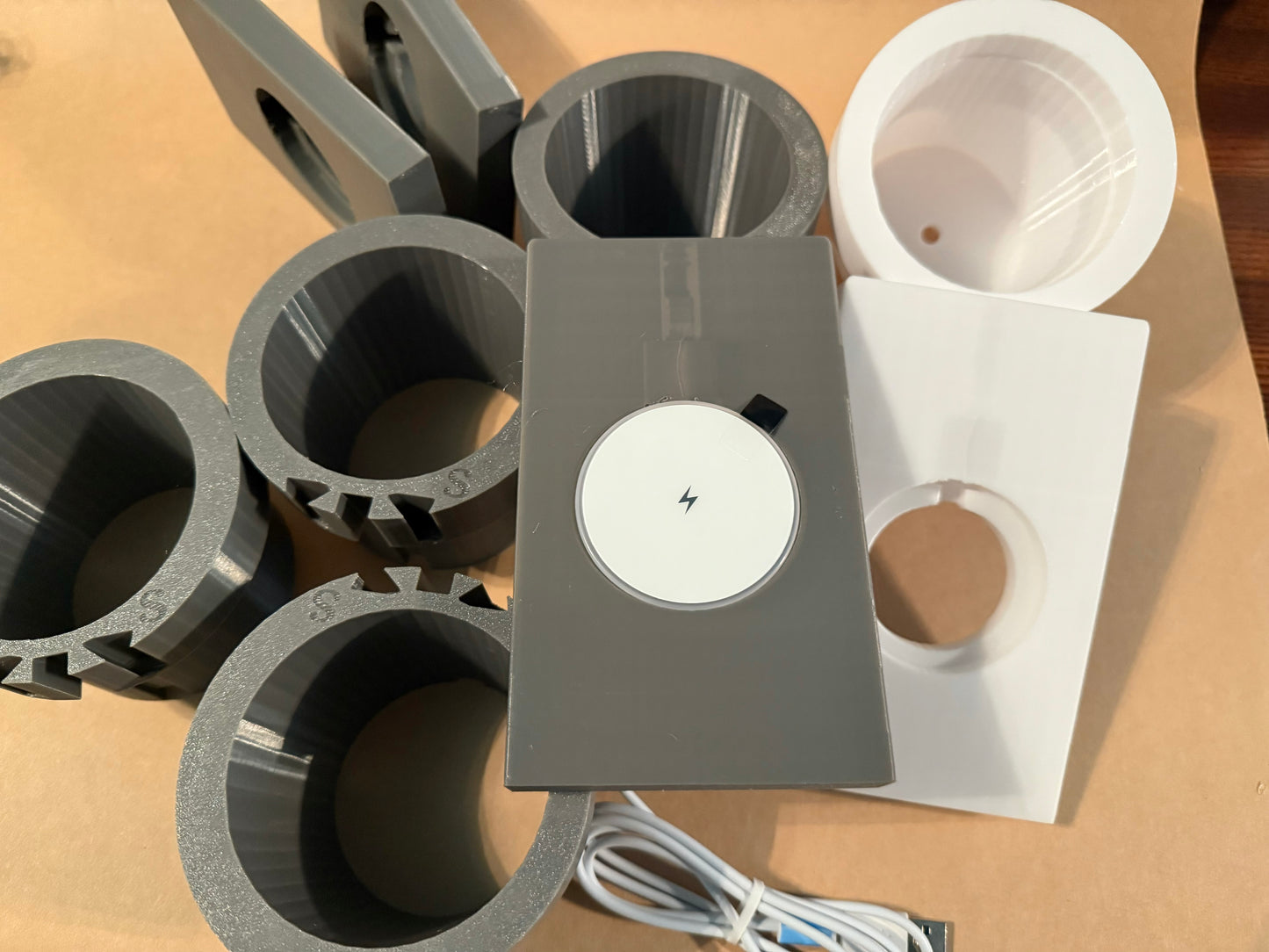 Phone holder/charger bundle, one usb and one power pack version